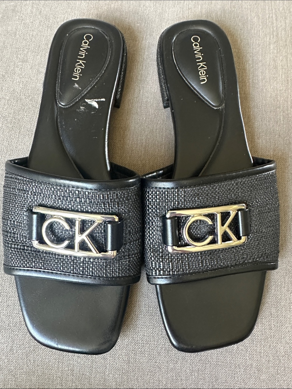 Calvin Klein Black Slide Mules with Silver CK Emblem